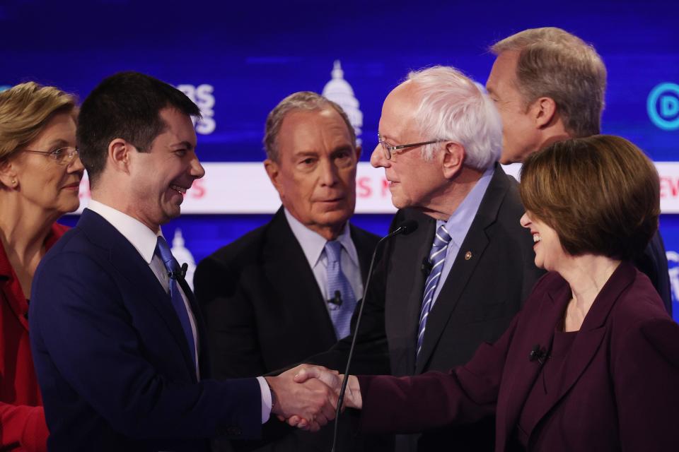 Democratic presidential candidates Sen. Elizabeth Warren (D-MA), former South Bend, Indiana Mayor Pete Buttigieg, former New York City Mayor Mike Bloomberg, Sen. Bernie Sanders (I-VT), Sen. Amy Klobuchar (D-MN), and Tom Steyer speak after the Democratic presidential primary debate.