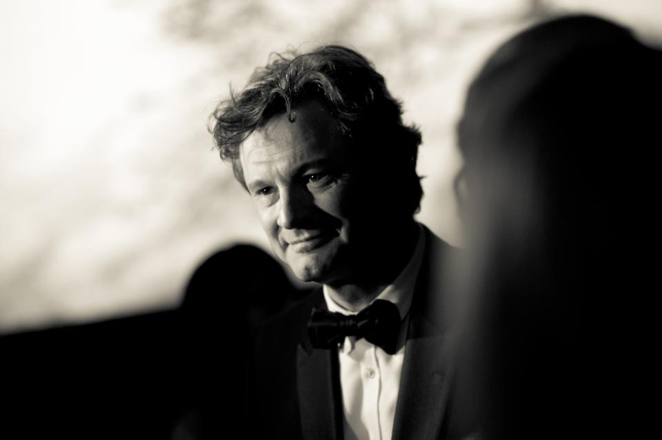DUBAI, UNITED ARAB EMIRATES - DECEMBER 14: (EDITORS NOTE: Image has been converted to black and white) Actor Colin Firth attends the 2012 Dubai International Film Festival, Dubai Cares and Oxfam "One Night to Change Lives" Charity Gala at the Armani Hotel on December 14, 2012 in Dubai, United Arab Emirates. (Photo by Gareth Cattermole/Getty Images for DIFF)