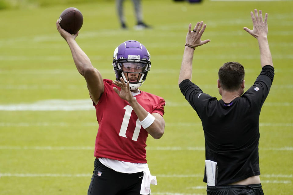 Minnesota Vikings rookie quarterback Kellen Mond throws during NFL football practice in Eagan, Minn., Wednesday, June 2, 2021.(AP Photo/Jim Mone)