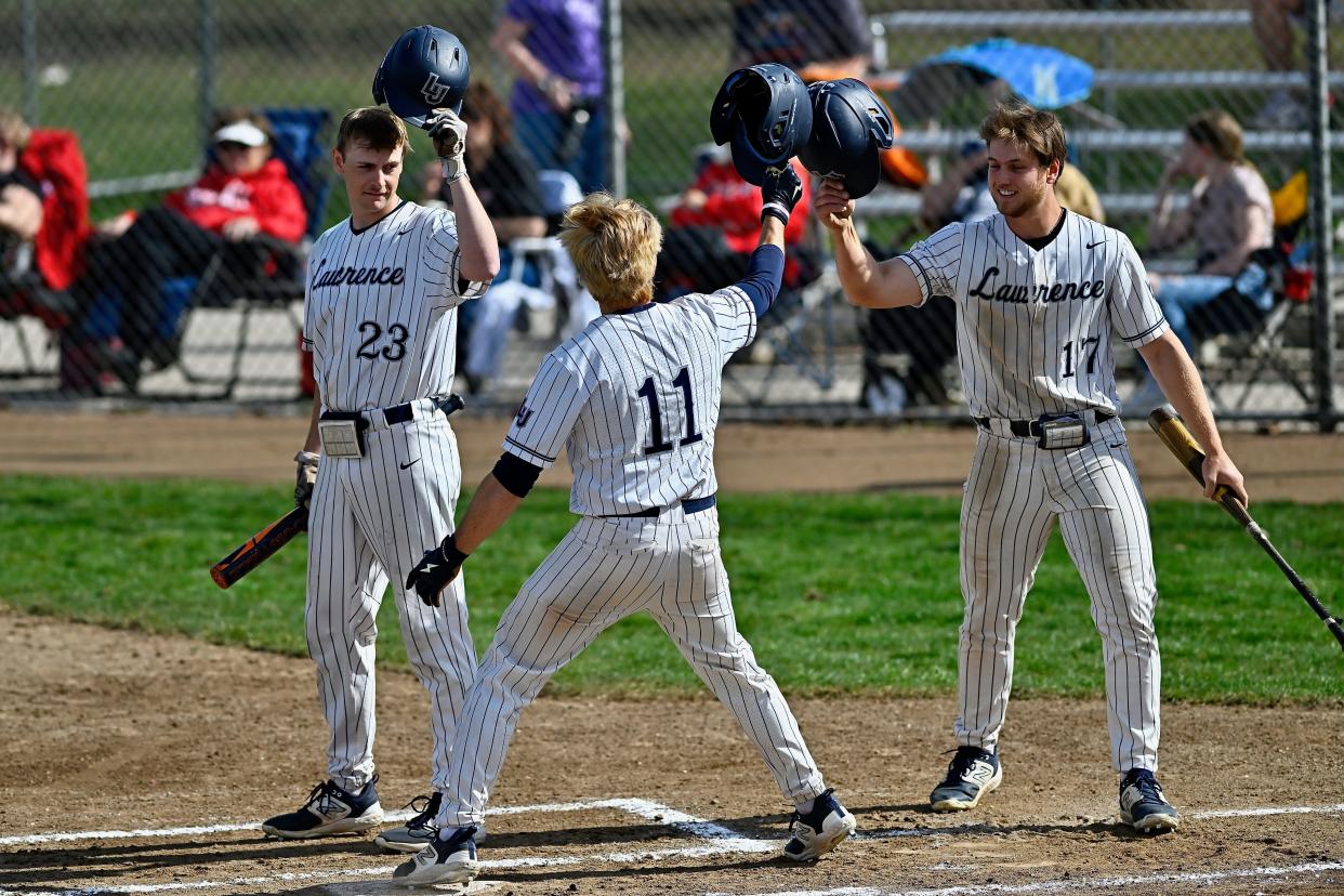 Lawrence University outfielders Edan Perez (11), Jacob Charon (23) and Parker Knoll (17) have formed arguably the most prolific outfield trio in NCAA Division III baseball this season.