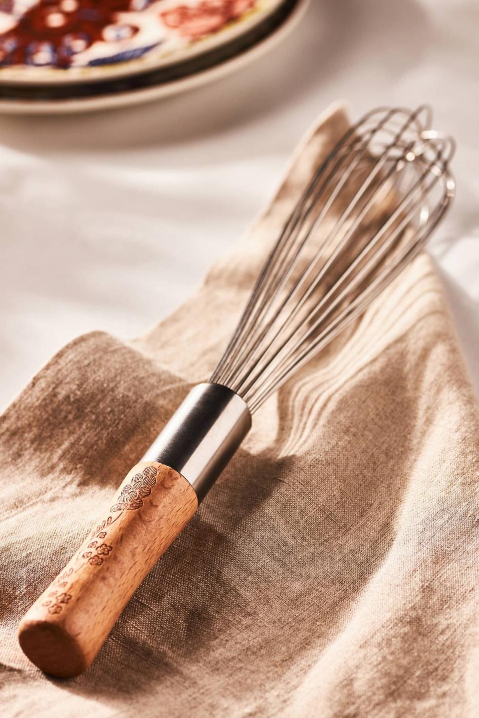 <p><a href="https://go.redirectingat.com?id=74968X1596630&url=https%3A%2F%2Fwww.anthropologie.com%2Fshop%2Fjerrelle-guy-whisk&sref=https%3A%2F%2Fwww.housebeautiful.com%2Fshopping%2Fa42686820%2Fjerrelle-guy-anthropologie%2F" rel="nofollow noopener" target="_blank" data-ylk="slk:Shop Now;elm:context_link;itc:0;sec:content-canvas" class="link ">Shop Now</a></p><p>Jerrelle Guy Whisk</p><p>$10.00</p><p>anthropologie.com</p><span class="copyright">Anthropologie</span>