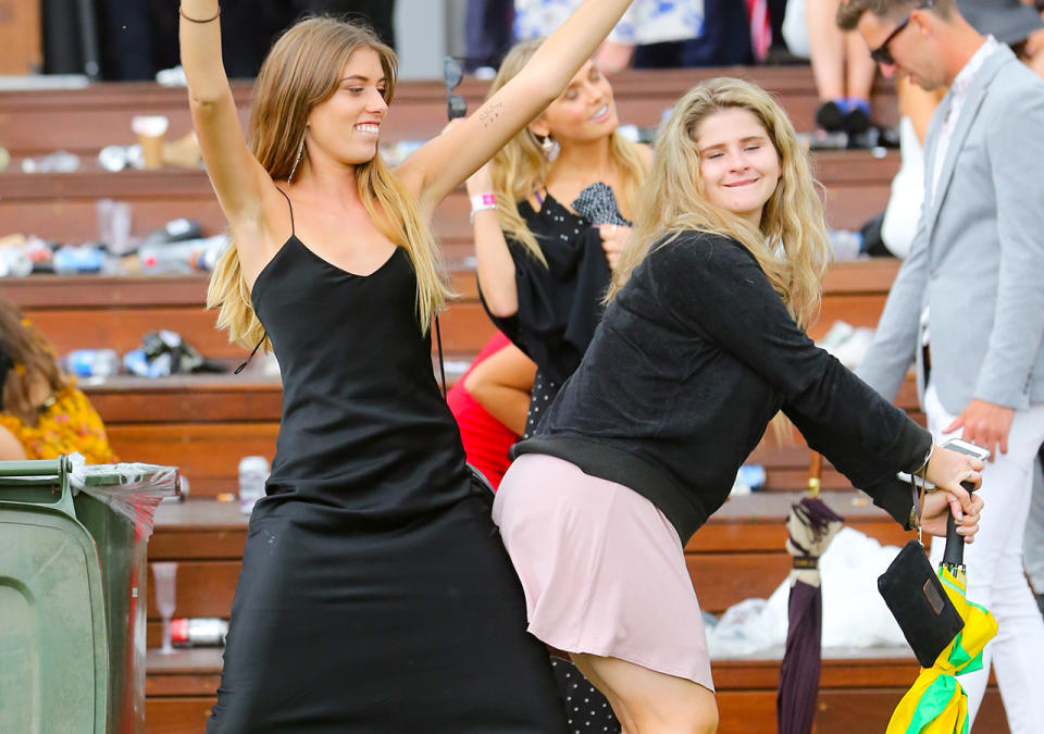 Melbourne Cup punters, pictured here at the end of a very long day in 2018.