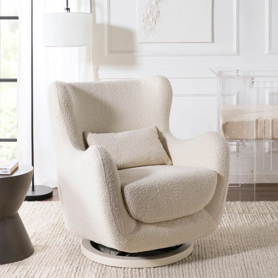 <p><a href="https://babyletto.com/products/solstice-swivel-glider-in-boucle?variant=40709740396598" rel="nofollow noopener" target="_blank" data-ylk="slk:Shop Now;elm:context_link;itc:0;sec:content-canvas" class="link rapid-noclick-resp">Shop Now</a></p><p>Swivel Glider</p><p>babyletto.com</p><p>$899.00</p><span class="copyright">babyletto.com</span>