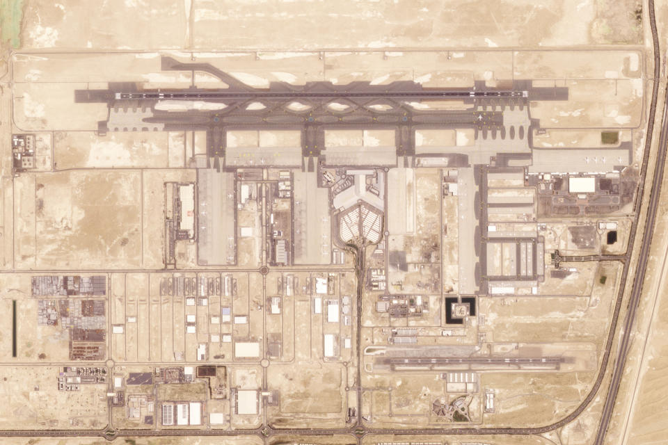 This satellite image from Planet Labs PBC shows Al Maktoum International Airport at Dubai World Central on Friday, April 26, 2024. Dubai International Airport, the world's busiest for international travel, will move its operations to the city-state's second, sprawling airfield in its southern desert reaches "within the next 10 years" in a project worth nearly $35 billion, its ruler said Sunday, April 28, 2024. (Planet Labs PBC via AP)