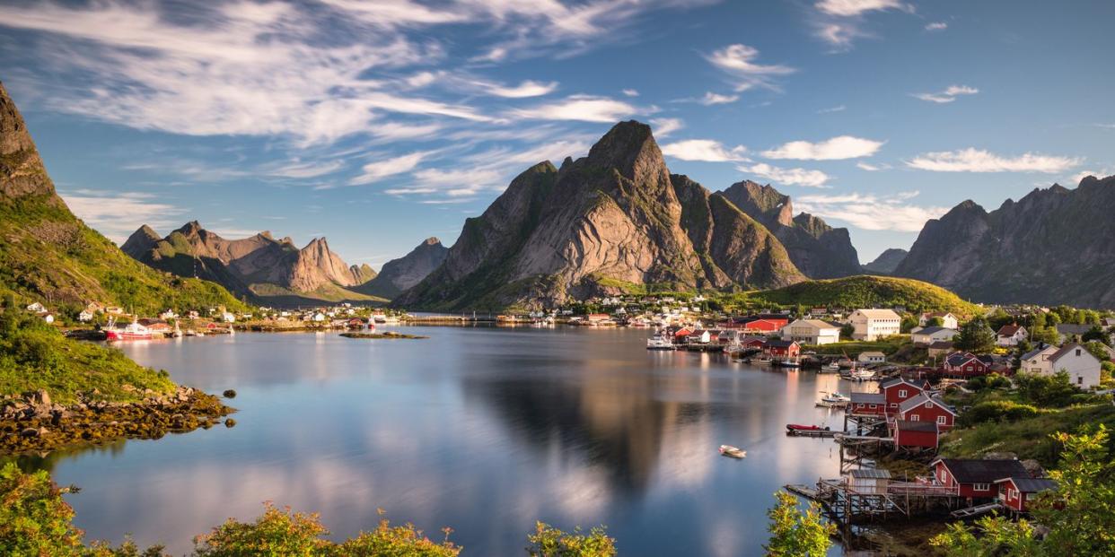 view on reine, a small fishing village on lofoten islands, as seen during sunrise in august captured in norway