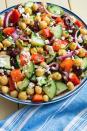 <p>Thanks to the chickpeas, this salad will keep you full for hours. It's satisfying in a way that leafy greens never could be. Sorry not sorry, kale. </p><p>Get the <a href="https://www.delish.com/uk/cooking/recipes/a29843193/mediterranean-chickpea-salad-recipe/" rel="nofollow noopener" target="_blank" data-ylk="slk:Mediterranean Chickpea Salad;elm:context_link;itc:0;sec:content-canvas" class="link ">Mediterranean Chickpea Salad</a> recipe.</p>
