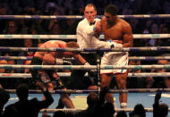 Boxing - Anthony Joshua v Alexander Povetkin - WBA Super, IBF, WBO & IBO World Heavyweight Titles - Wembley Stadium, London, Britain - September 22, 2018 Anthony Joshua in action against Alexander Povetkin Action Images via Reuters/Peter Cziborra