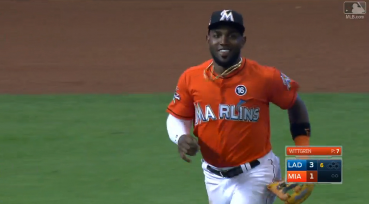 You're allowed to smile after you take away a home run like Marcell Ozuna. (Screenshot via MLB.com)