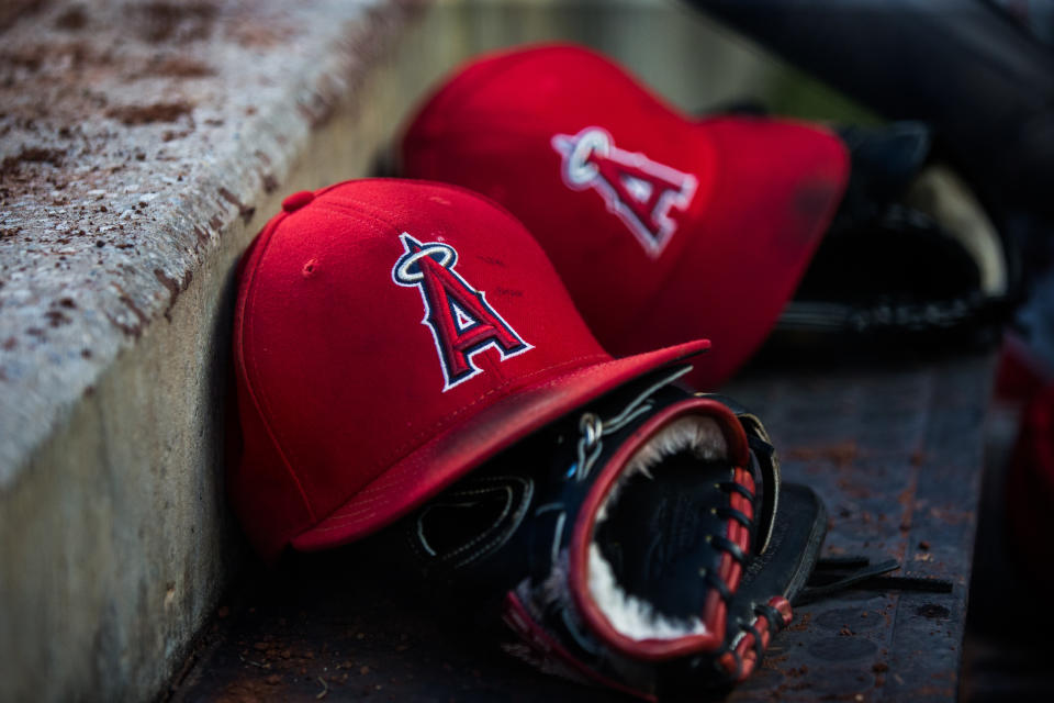 NEW YORK, NY - MAY 25:  A general view of a Los Angeles Angels hat in the dugout during the game between the New York Yankees and the Los Angeles Angels at Yankee Stadium on Friday May 25, 2018 in the Bronx borough of New York City. (Photo by Rob Tringali/SportsChrome/Getty Images) *** Local Caption ***