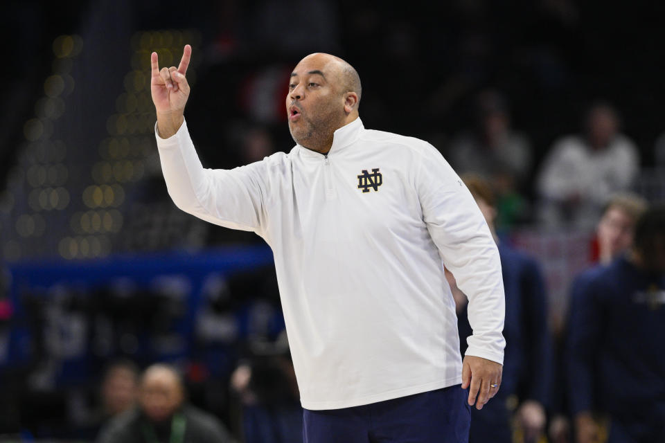 Notre Dame head coach Micah Shrewsberry directs his team during the first half of an NCAA college basketball game against Wake Forest in the second round of the Atlantic Coast Conference tournament, Wednesday, March 13, 2024, in Washington.(AP Photo/Nick Wass)