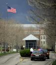 Authorities roadblock the Sprint Campus, which is next door to the scene of a shooting at the Jewish Community Center of Greater Kansas City in Overland Park, Kansas April 13, 2014. (REUTERS/Dave Kaup)