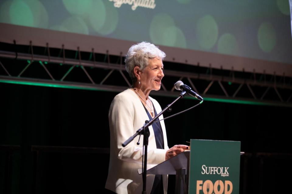 East Anglian Daily Times: Jayne Lindill, editor of Suffolk Magazine, on stage at the Suffolk Food & Drink Awards 2024