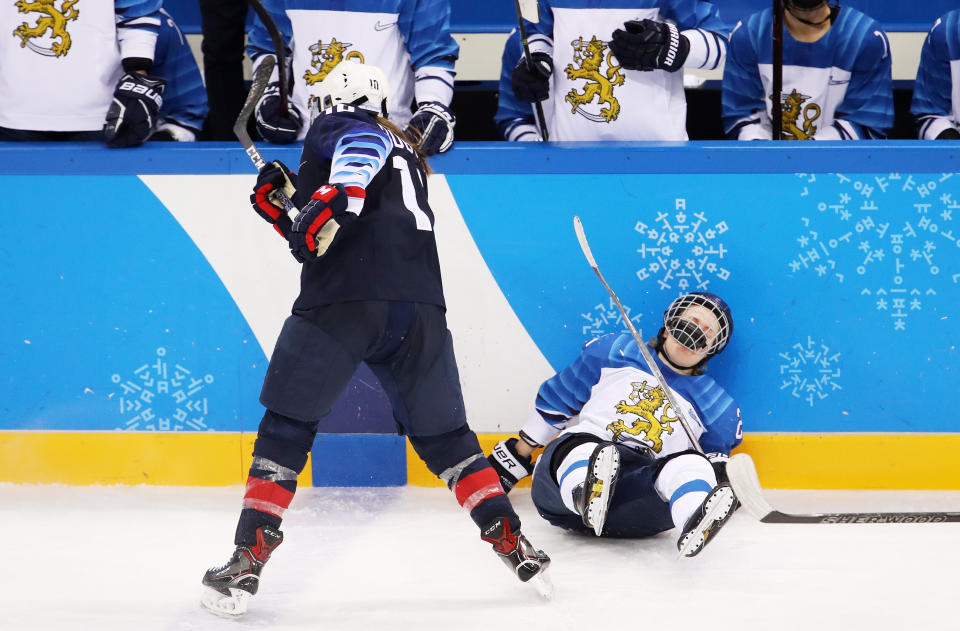 <p>Meghan Duggan #10 of the United States checks Noora Tulus #24 of Finland into the boards during the Ice Hockey Women Play-offs Semifinals on day 10 of the PyeongChang 2018 Winter Olympic Games at Gangneung Hockey Centre on February 19, 2018 in Pyeongchang-gun, South Korea. (Photo by Bruce Bennett/Getty Images) </p>