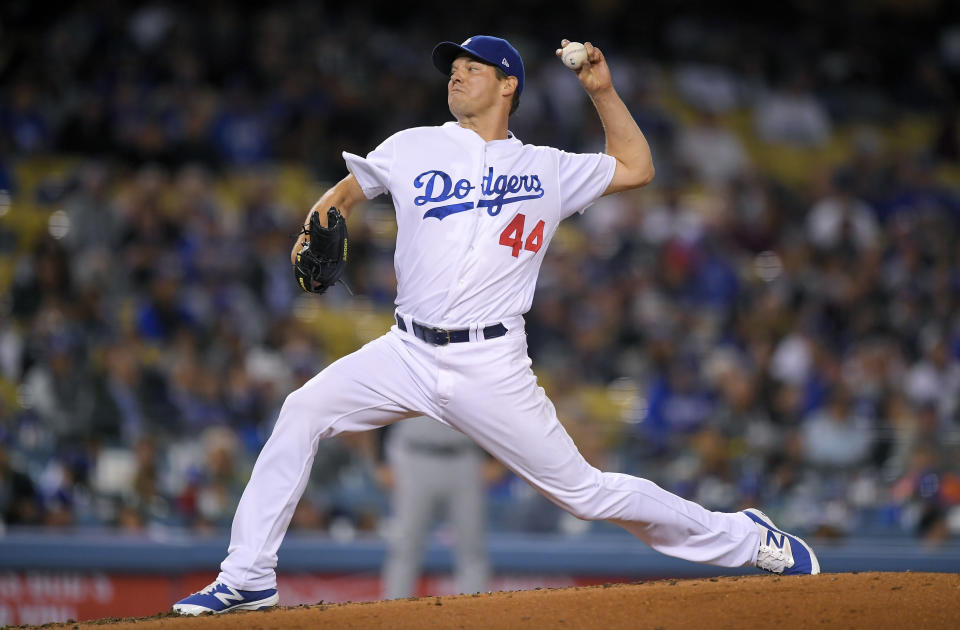 Veteran Rich Hill picked up the win as the Dodgers clinched the NL West. (AP)