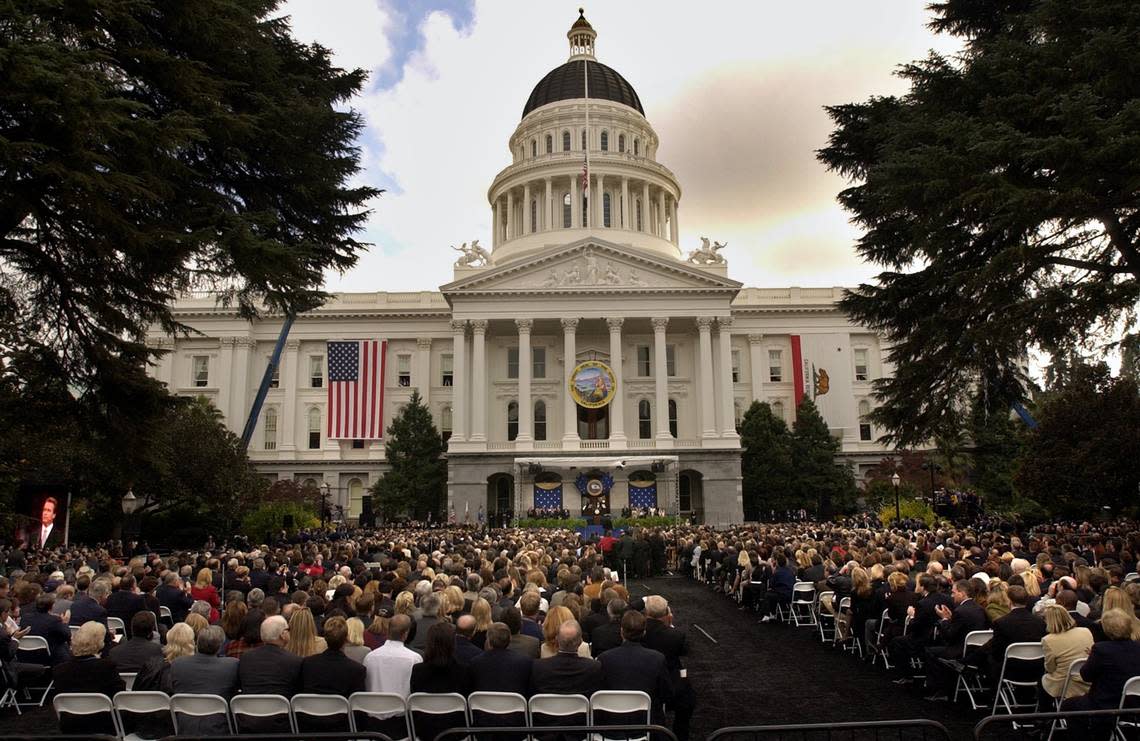 Guests watch the swearing in of Gov. Arnold Schwarzenegger at the state Capitol on Nov. 17, 2003. Lezlie Sterling/Sacramento Bee file