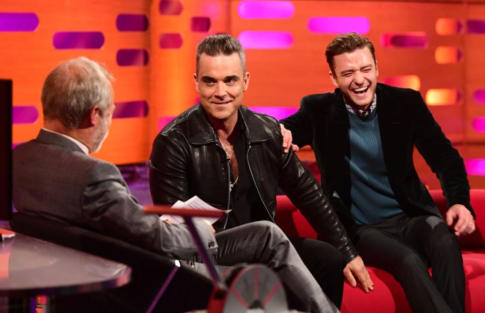 Robbie Williams appears as a guest on the Graham Norton Show in 2016 alongside Justin Timberlake.