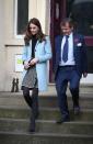 <p>Kate’s duck egg Mulberry coat set her back £990. She paired the wool coat with a printed Dolce & Gabbana skirt costing £330.<br><i>[Photo: PA]</i> </p>