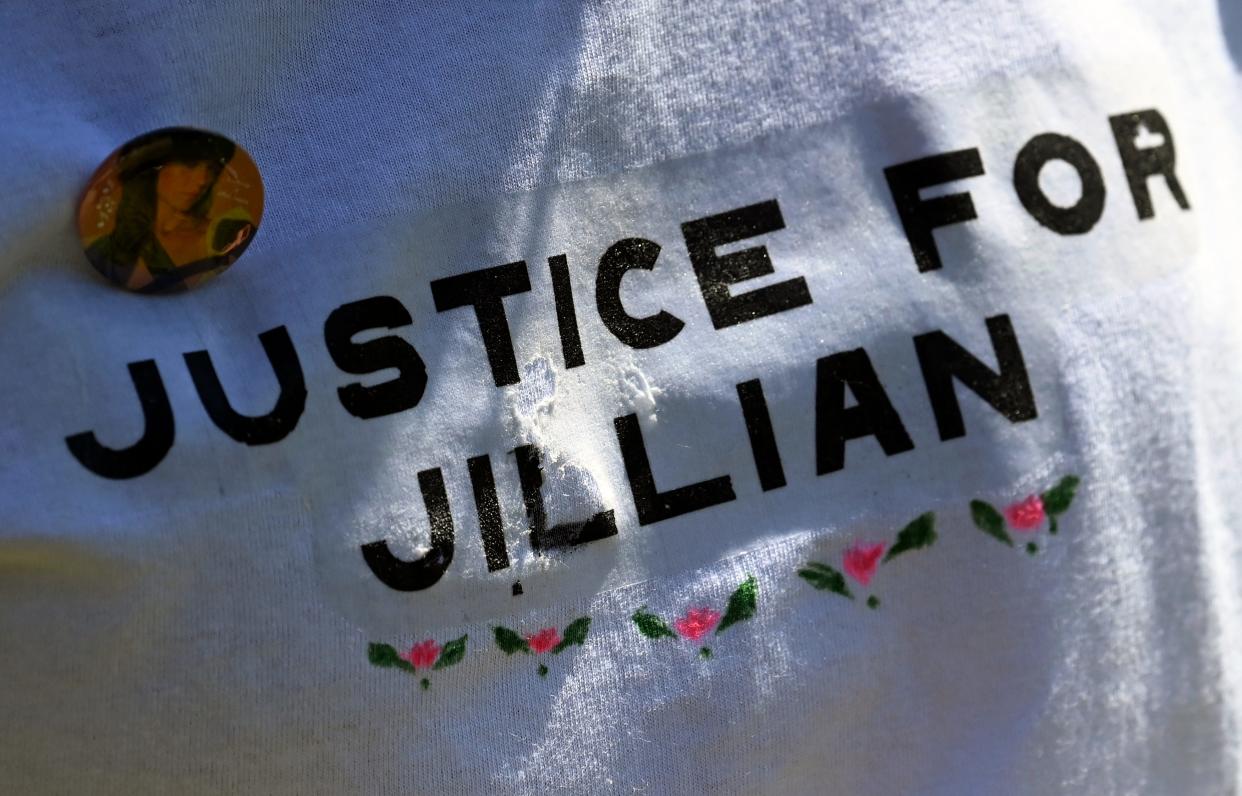 Belmont University student Livia Mechalovich wears a T-shirt honoring fellow student Jillian Ludwig during an Edgehill community memorial on April 13. Ludwig was jogging in the park when she was struck and killed by a stray bullet in November.