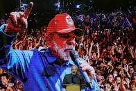 Brazil's former President Luiz Inacio "Lula" da Silva, who is running for reelection, speaks during a meeting with artists as he campaigns in Sao Paulo, Brazil, Monday, Sept. 26, 2022. Brazil's general elections are scheduled for Oct. 2. Polls show da Silva with a commanding lead that could possibly even give him a first-round victory without any need for a runoff. (AP Photo/Andre Penner)
