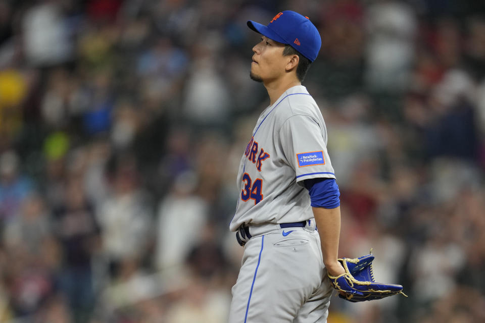 New York Mets starting pitcher Kodai Senga reacts after giving up a solo home run to Minnesota Twins' Carlos Correa during the fourth inning of a baseball game Friday, Sept. 8, 2023, in Minneapolis. (AP Photo/Abbie Parr)