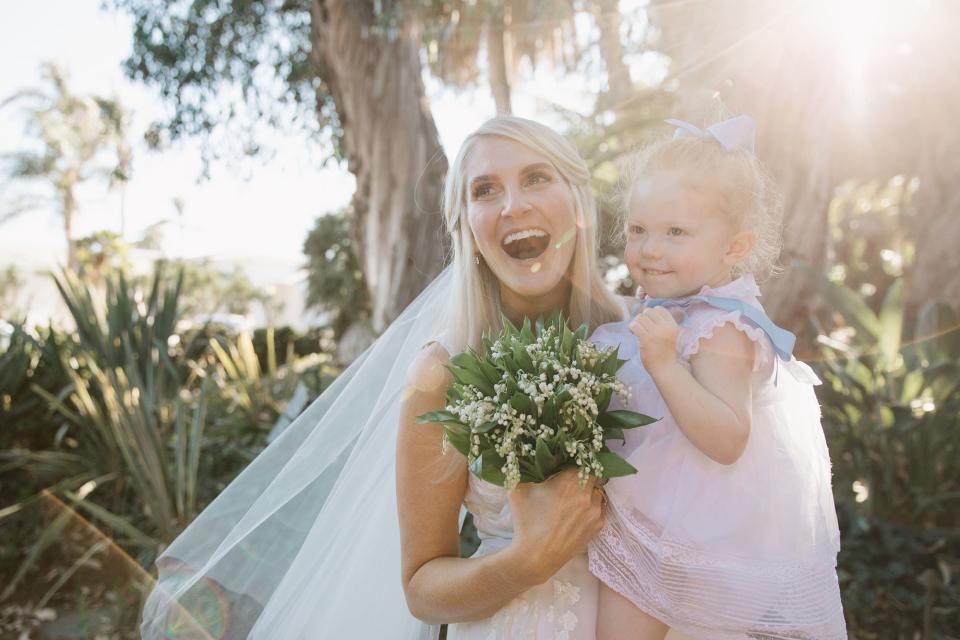 The bride combined California cool with English tradition, wore two Carolina Herrera dresses, and drove off in a vintage Porsche.