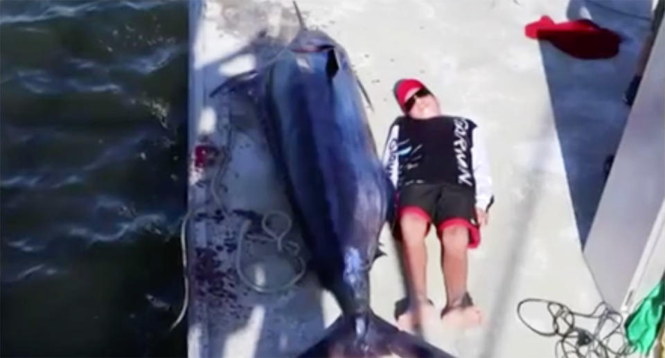 The 13-year-old has now broken a four-decade-long record for the heaviest Marlin caught by anyone under the age of 16. Image: 7 News