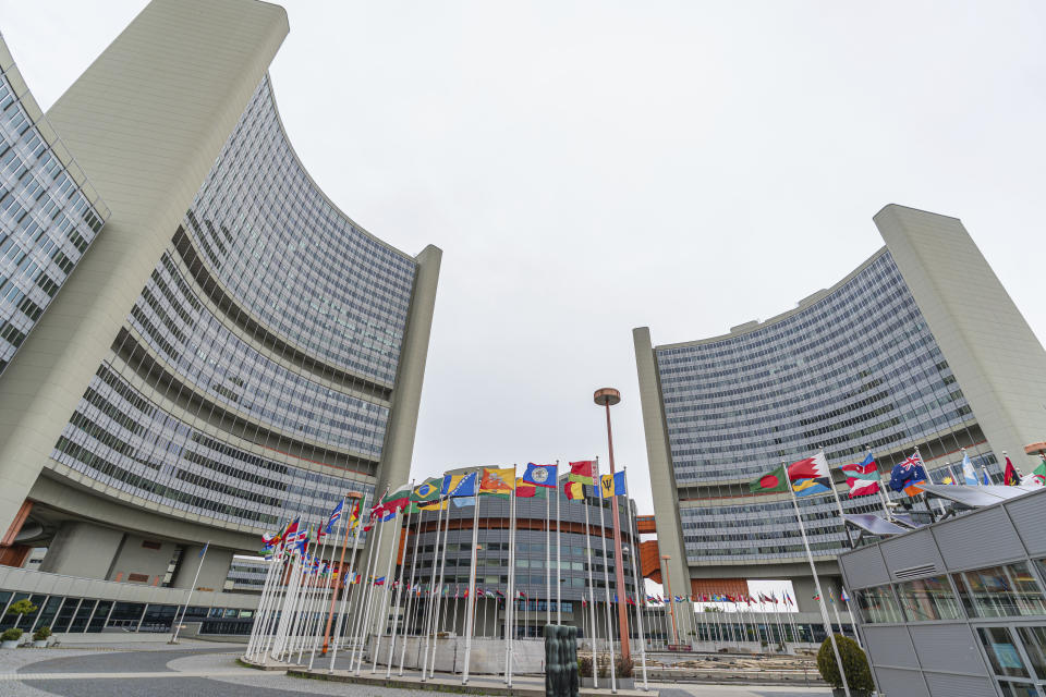 FILE - In this Monday, May 24, 2021 file photo, the flag of UN states wave in front of the the International Center building with the headquarters of the International Atomic Energy Agency, IAEA,in Vienna, Austria, Monday, May 24, 2021. The United Nations’ International Atomic Energy Agency watchdog reported Monday May 31, 2021, it hasn't been able to access data important to monitoring Iran’s nuclear program since late February when the Islamic Republic started restricting international inspections of its facilities. (AP Photo/Florian Schroetter, FILE)