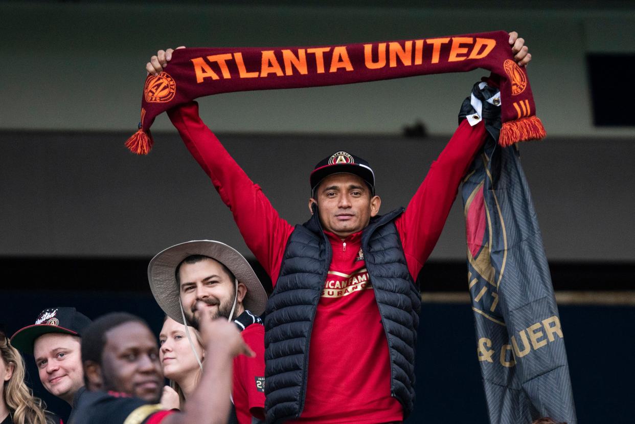 Fans wait the start of the MLS soccer match between New York City FC and Atlanta United at Yankee Stadium, Sunday, Nov. 21, 2021, in New York. (AP Photo/Eduardo Munoz Alvarez)