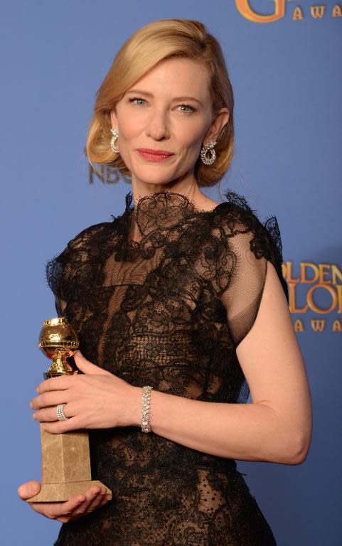 Actress Cate Blanchett celebrates winning Best Actress in a Motion Picture - Drama for "Blue Jasmine" during the 71st Annual Golden Globe Awards in Beverly Hills, California, January 12, 2014