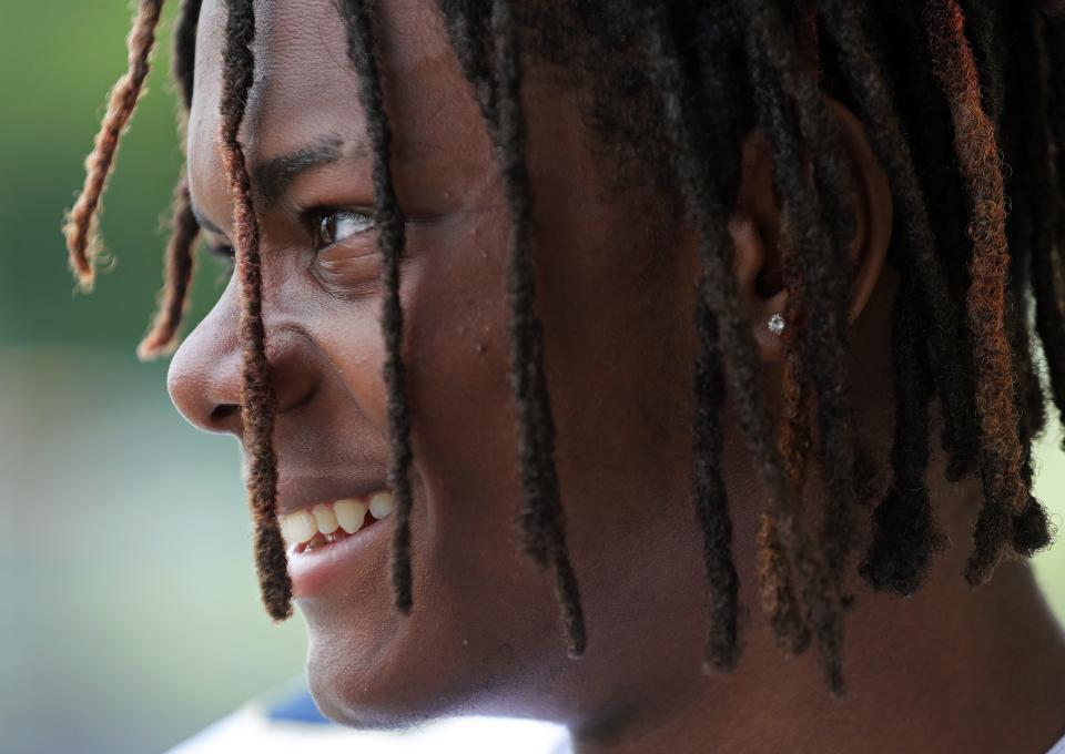 Hoban quarterback Tylan Boykin smiles as he talks about the upcoming season during the Knights football media day Monday at Dowed Field in Akron.