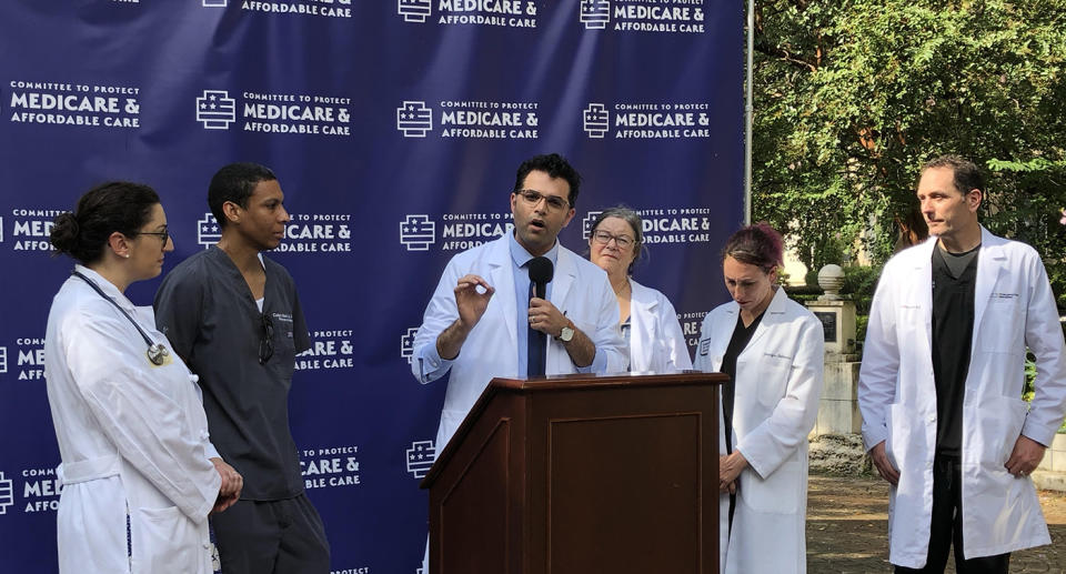 Dr. Pritesh Gandhi speaks at the rally. (Photo: Alexander Nazaryan/Yahoo News)