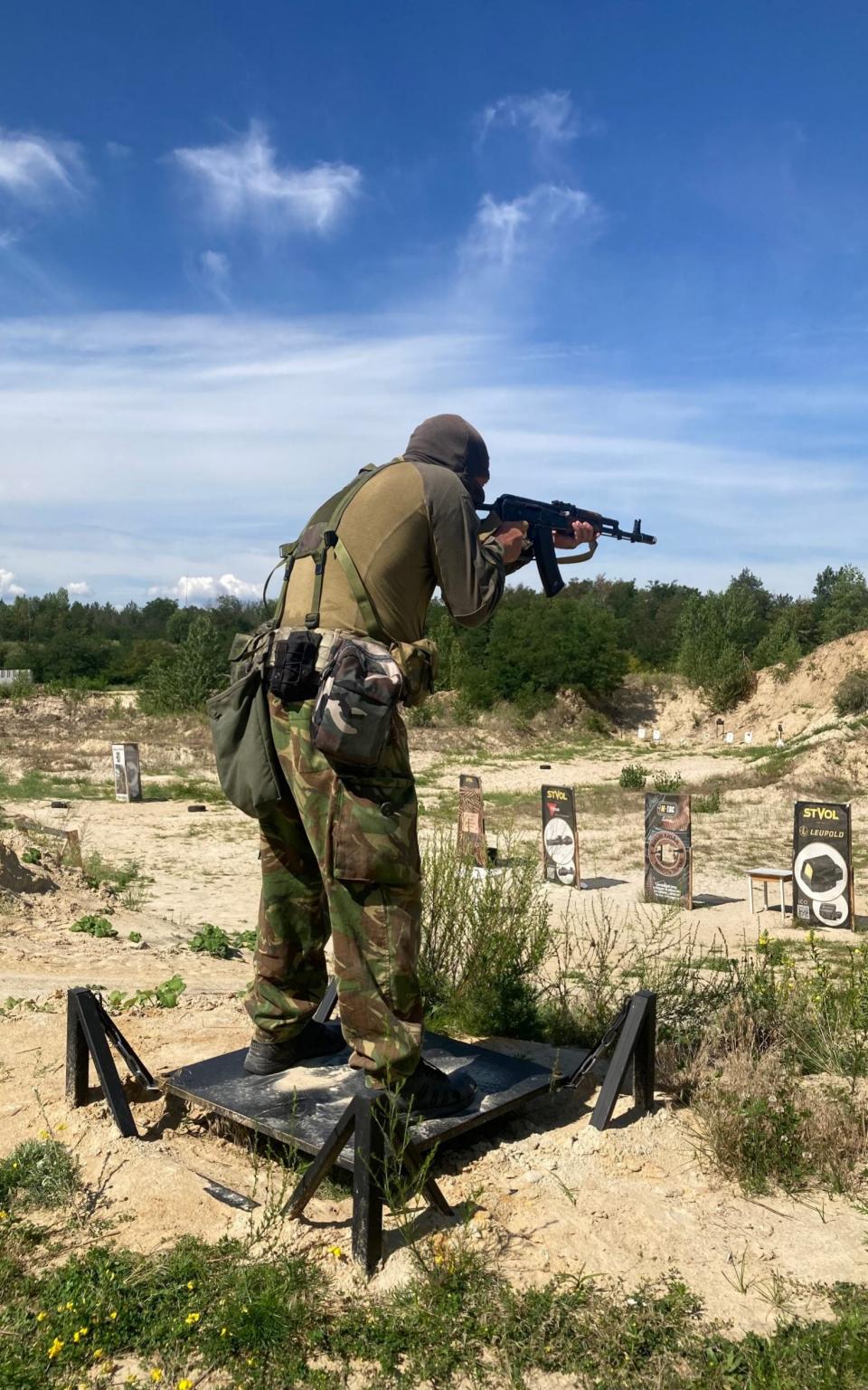 A weapon handling instructor shows recruits at the Territorial Defence unit of Boryspil city how to adopt the most stable firing position - Dominic Nicholls/The Telegraph