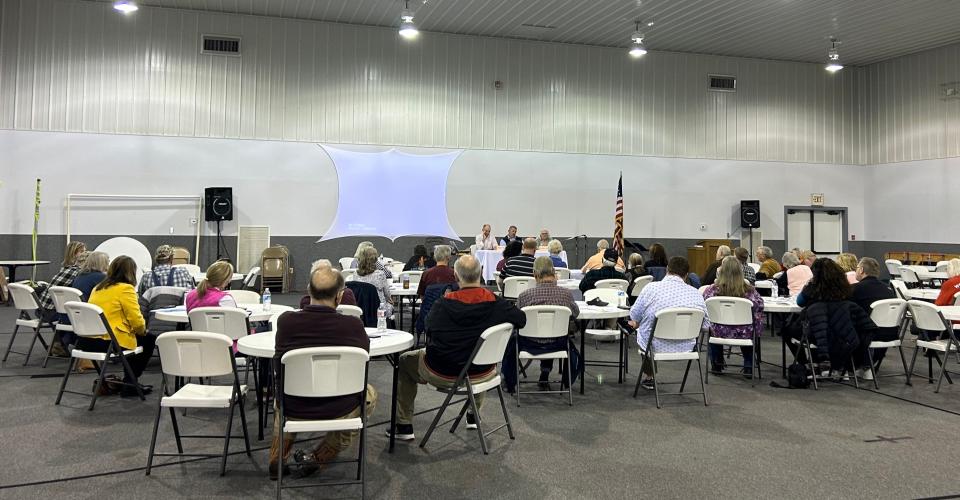 Attendees listen to school board candidates during a discussion forum at Jackson First Assembly Church on Feb. 20, 2024 in Jackson, Tenn.