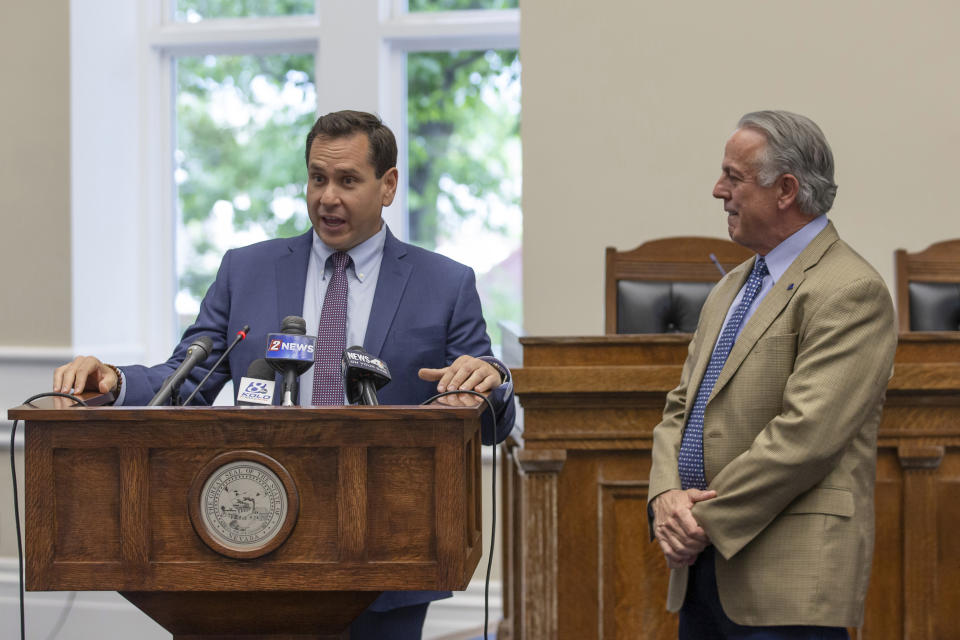 Nevada Secretary of State Cisco Aguilar speaks before Governor Joe Lombardo signs an election worker protection bill into law as Secretary of State Cisco Aguilar looks on at the old Assembly Chambers in Carson City, Nev., Tuesday, May 30, 2023. (AP Photo/Tom R. Smedes)