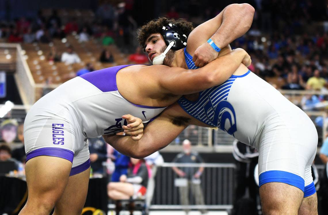 South Dade junior Sawyer Bartelt prepares to pin Southwest Miami’s Jonathan Fraga during the Class 3A 220-pound state title match on Saturday at Silver Spurs Arena in Kissimmee.