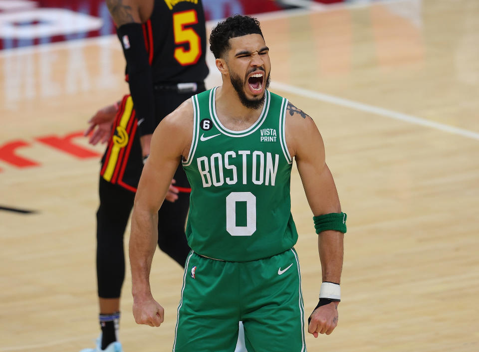 ATLANTA, GEORGIA - APRIL 23:  Jayson Tatum #0 of the Boston Celtics reacts after hitting a three-point basket against the Atlanta Hawks during the fourth quarter of Game Four of the Eastern Conference First Round Playoffs at State Farm Arena on April 23, 2023 in Atlanta, Georgia. NOTE TO USER: User expressly acknowledges and agrees that, by downloading and or using this photograph, User is consenting to the terms and conditions of the Getty Images License Agreement.  (Photo by Kevin C. Cox/Getty Images)