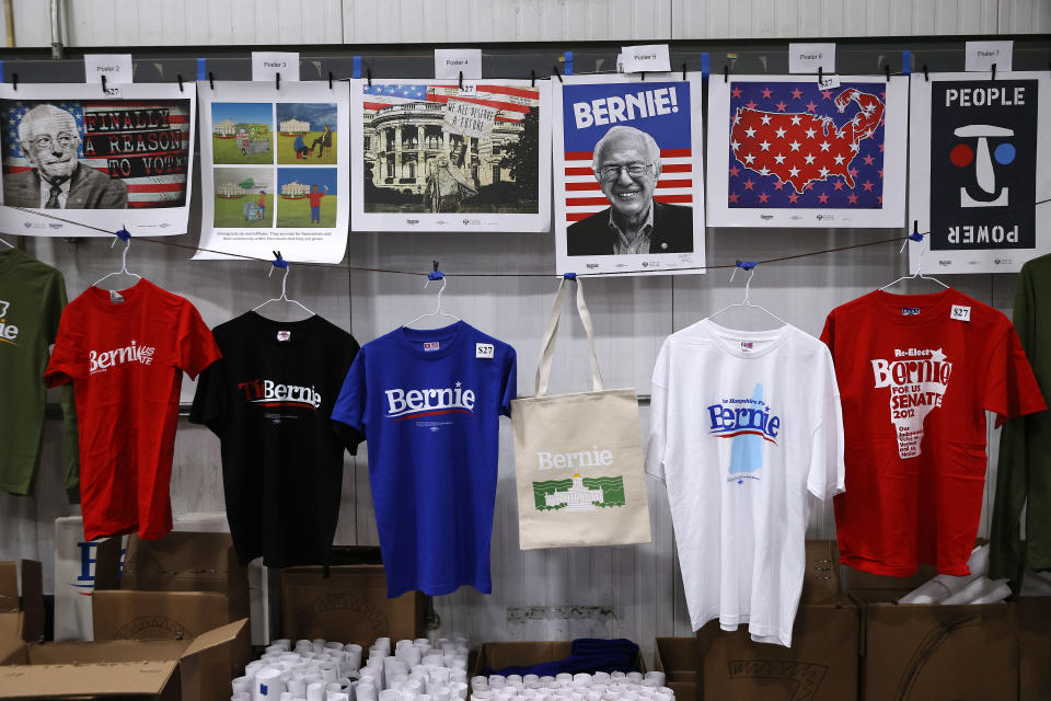 ESSEX JUNCTION, VERMONT - MARCH 03: Campaign shirts and posters are for sale during a Super Tuesday night rally with Democratic presidential candidate Sen. Bernie Sanders (I-VT) at the Champlain Valley Expo March 03, 2020 in Essex Junction, Vermont. 1,357 Democratic delegates are at stake as voters cast their ballots in 14 states and American Samoa on what is known as Super Tuesday. (Photo by Chip Somodevilla/Getty Images)