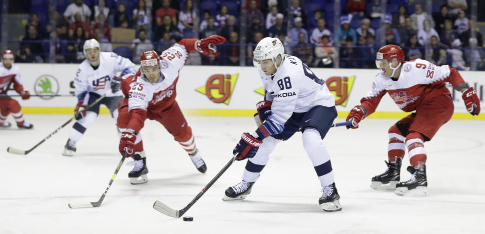 Patrick Kane of the US controls the puck during the Ice Hockey World Championships group A match between Denmark and the United States at the Steel Arena in Kosice, Slovakia, Saturday, May 18, 2019. (AP Photo/Petr David Josek)