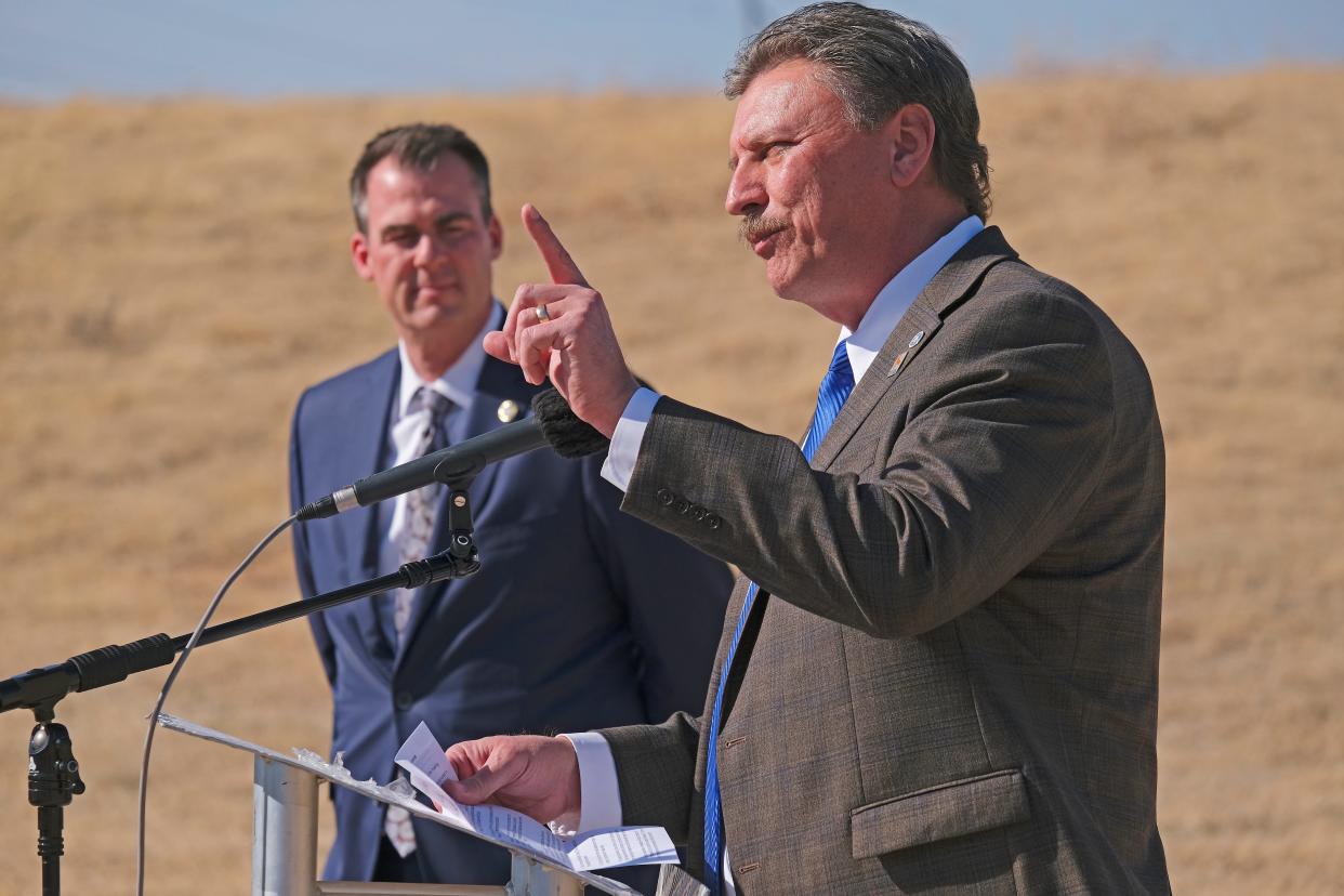 Gov. Kevin Stitt, left, and Transportation Secretary Tim Gatz have touted a 15-year turnpike expansion plan called ACCESS Oklahoma.