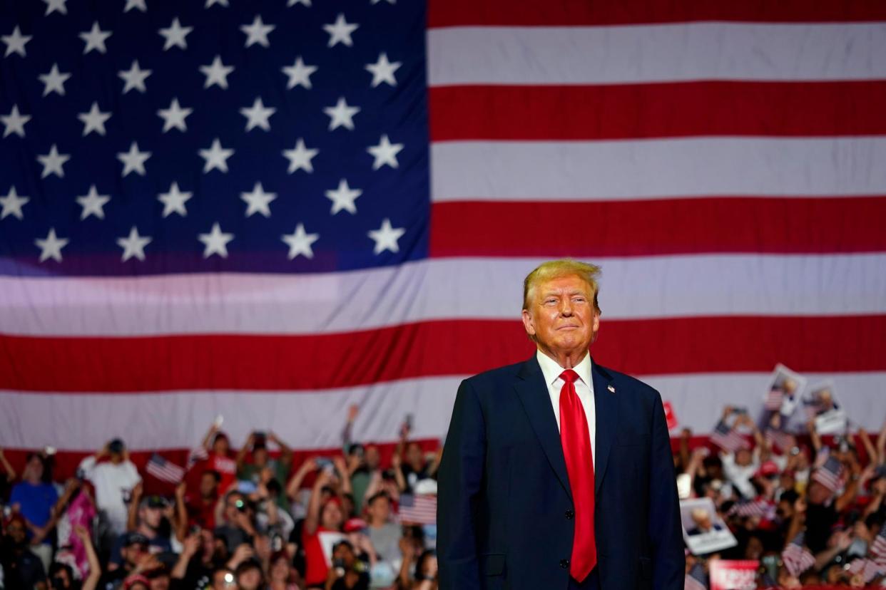 <span>Donald Trump campaigns in Philadelphia on 22 June 2024.</span><span>Photograph: Chris Szagola/AP</span>