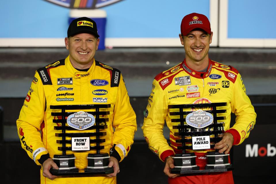 Joey Logano (right) will be in pole position for the Daytona 500. Michael McDowell (left) will join him in the front row.