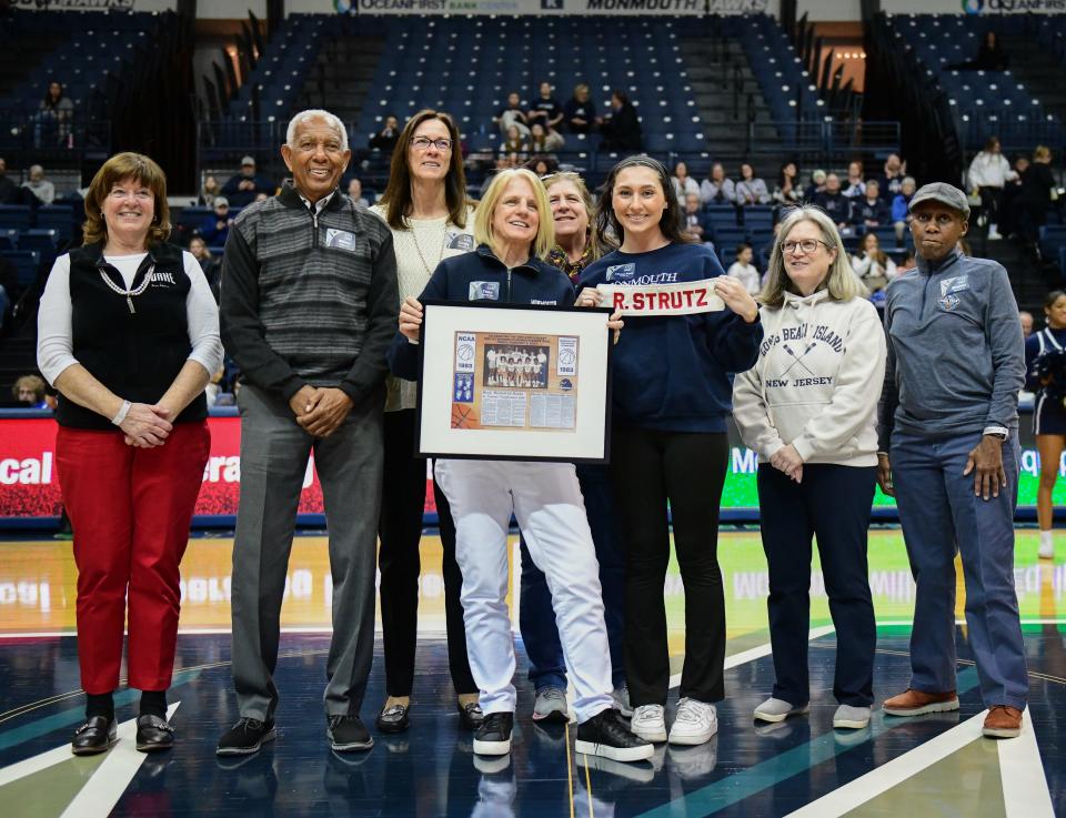 Members of the 1983 Monmouth women's basketball team are honored at a Monmouth game on March 2, 2023 in West Long Branch.