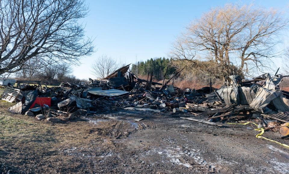 The remains of a fire on Shanley Road in Paris on Saturday, December 10, 2022. At least 10 departments responded to a structure fire Friday night in Paris after high winds helped drive the blaze and left the single-family home a total loss, firefighters reported. 