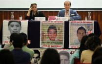 Members of the Interdisciplinary Group of Independent Experts (GIEI) attend a news conference in Mexico City