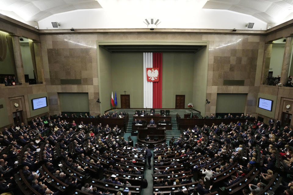 Poland's Prime Minister Mateusz Morawiecki making a policy speech of his new government in parliament, in Warsaw, Poland, Monday Dec. 11, 2023. The national conservatives who have ruled Poland for eight years are expected to finally relinquish power this week to a centrist bloc led by political veteran Donald Tusk. (AP Photo/Czarek Sokolowski)