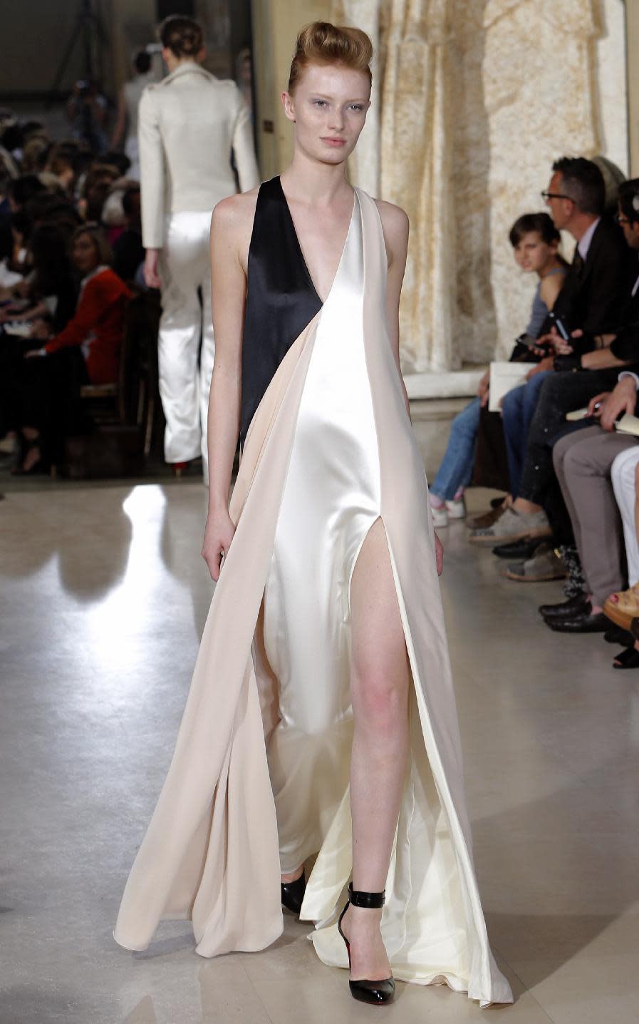 A model wears a creation by fashion designer Bouchra Jarrar during the Women's Fall Winter 2013-2014 haute couture fashion collection presented at Antoine Bourdelle Museum in Paris Tuesday, July 2, 2013 in Paris. (AP Photo/Jacques Brinon)