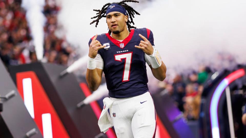 <div>HOUSTON, TEXAS - JANUARY 13: C.J. Stroud #7 of the Houston Texans celebrates as he runs onto the field during player introductions before an AFC wild-card playoff football game against the <a class="link " href="https://sports.yahoo.com/nfl/teams/cleveland/" data-i13n="sec:content-canvas;subsec:anchor_text;elm:context_link" data-ylk="slk:Cleveland Browns;sec:content-canvas;subsec:anchor_text;elm:context_link;itc:0">Cleveland Browns</a> at NRG Stadium on January 13, 2024 in Houston, Texas. (Photo by Ryan Kang/Getty Images)</div>