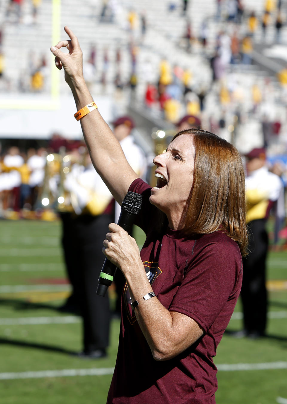 U.S. Rep. Martha McSally, R-Ariz. sings the national anthem before an NCAA college football game between Arizona State and Utah, Saturday, Nov 3, 2018, in Tempe, Ariz. (AP Photo/Rick Scuteri)