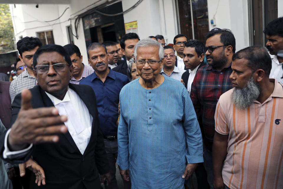 Nobel laureate Muhammad Yunus, center, comes out of a courtroom after he was granted bail in an embezzlement case, in Dhaka, Bangladesh, Sunday, Mar. 03, 2024. (AP Photo/Mahmud Hossain Opu)