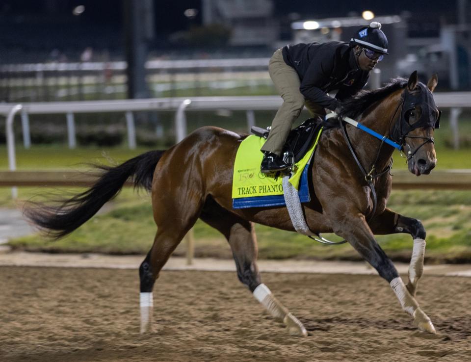 Kentucky Derby hopeful Track Phantom gallops on the track during a morning workout at Churchill Downs.